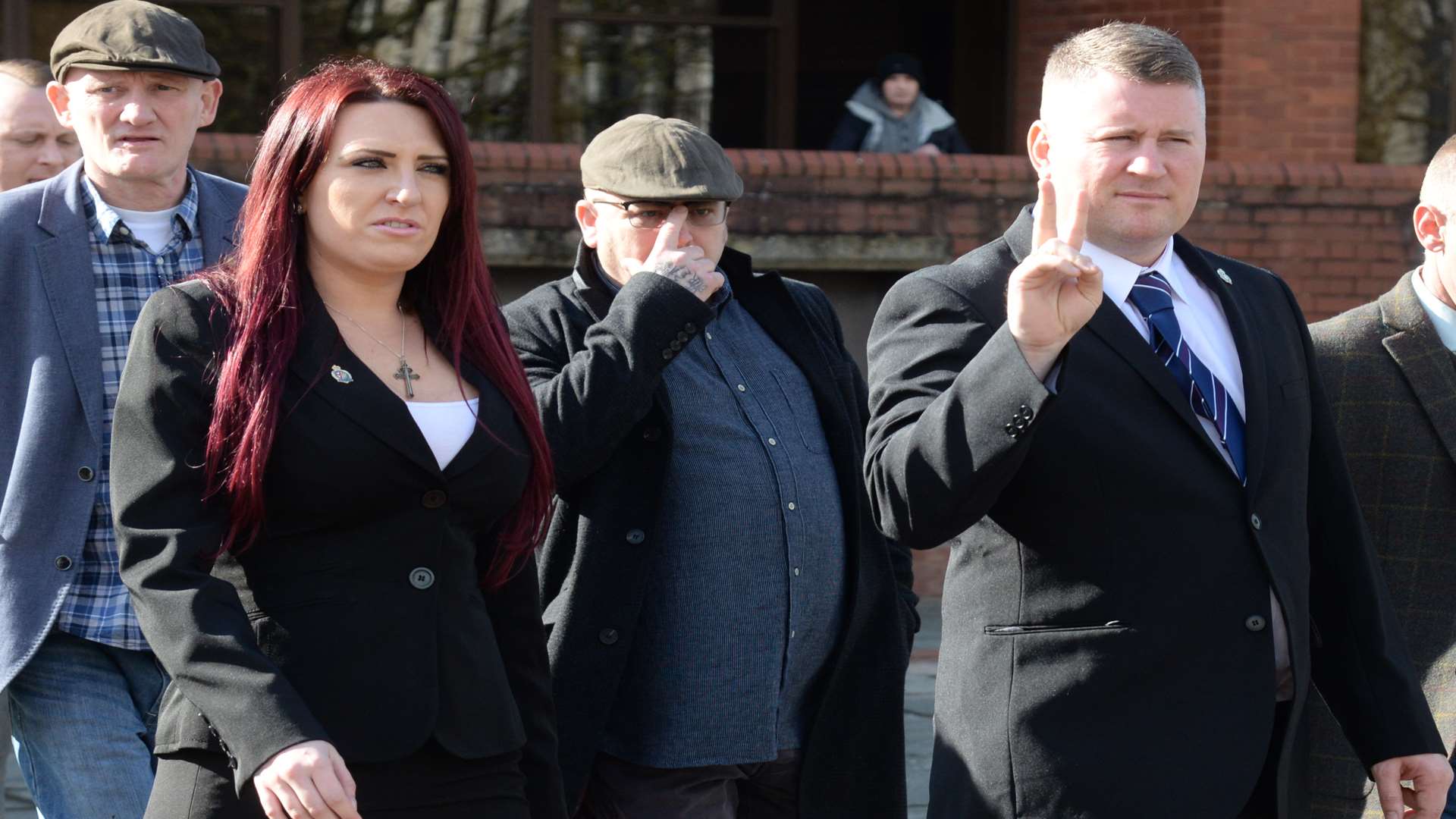 Britain First leader Paul Golding, right, and deputy leader Jayda Fransen arrive at Folkestone Magistrates Court