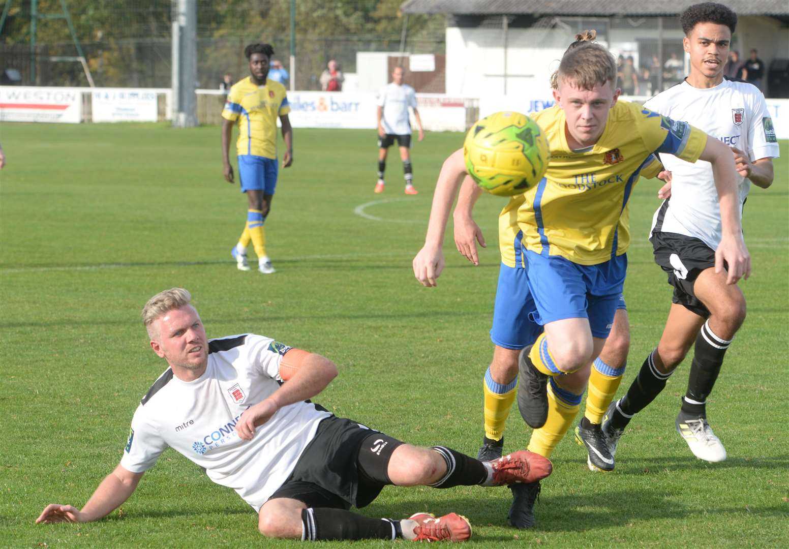 Sittingbourne (yellow) won 2-0 at Faversham on Saturday to earn their place in the First Round Qualifying draw Picture: Chris Davey