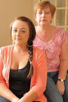Marie Doyle, pictured with mother Andrea, found a plaster stuck to a chicken at Asda. , pictured right with mother Andrea,