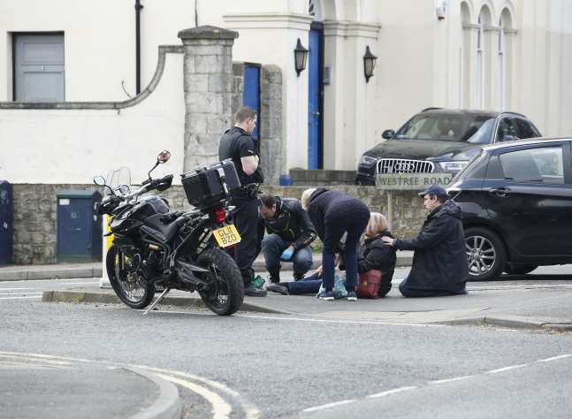A woman was hit by a motorbike at the junction of Westree Road.