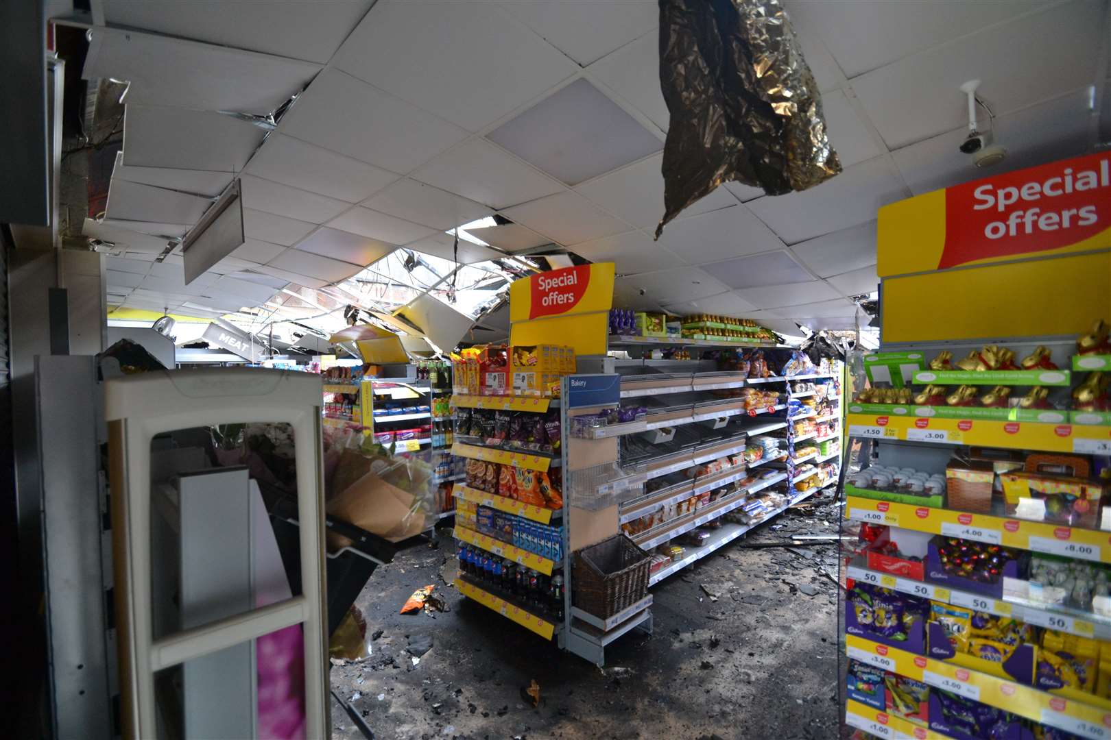 The full extent of the fire damage is seen in this interior picture of the wrecked Tesco Express store in Mace Lane, Ashford Picture: Steve Salter