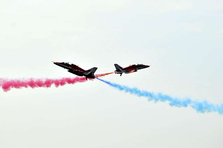 Crossover: Two Red Arrows pilots show their stunning skills at Folkestone Airshow.