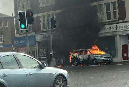 The car was alight in The Broadway, Broadstairs. Picture: Dave Lambert