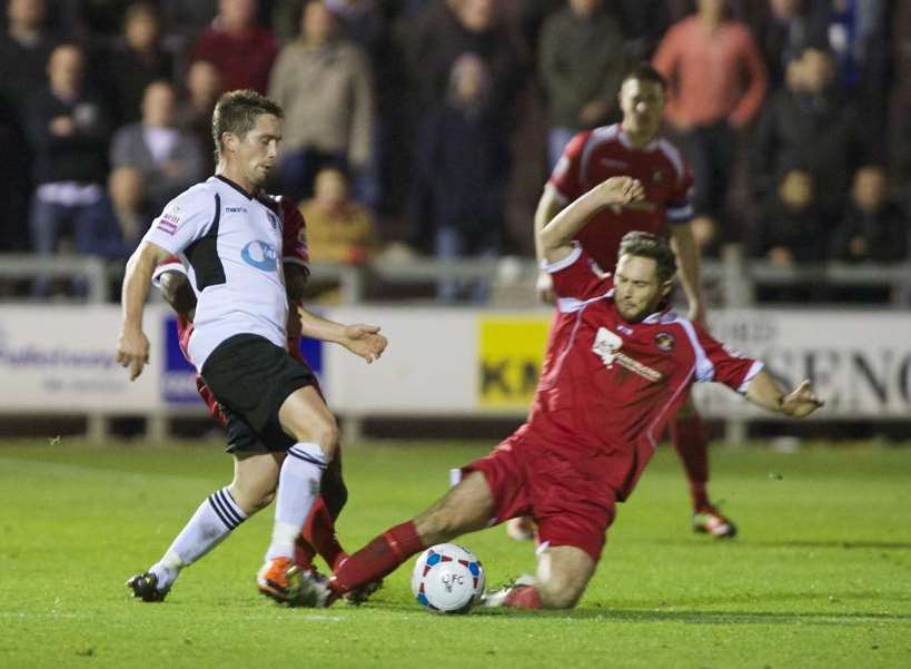 Dean Rance chalenegs Lee Noble during the last meeting between Dartford and Ebbsfleet Picture: Andy Payton