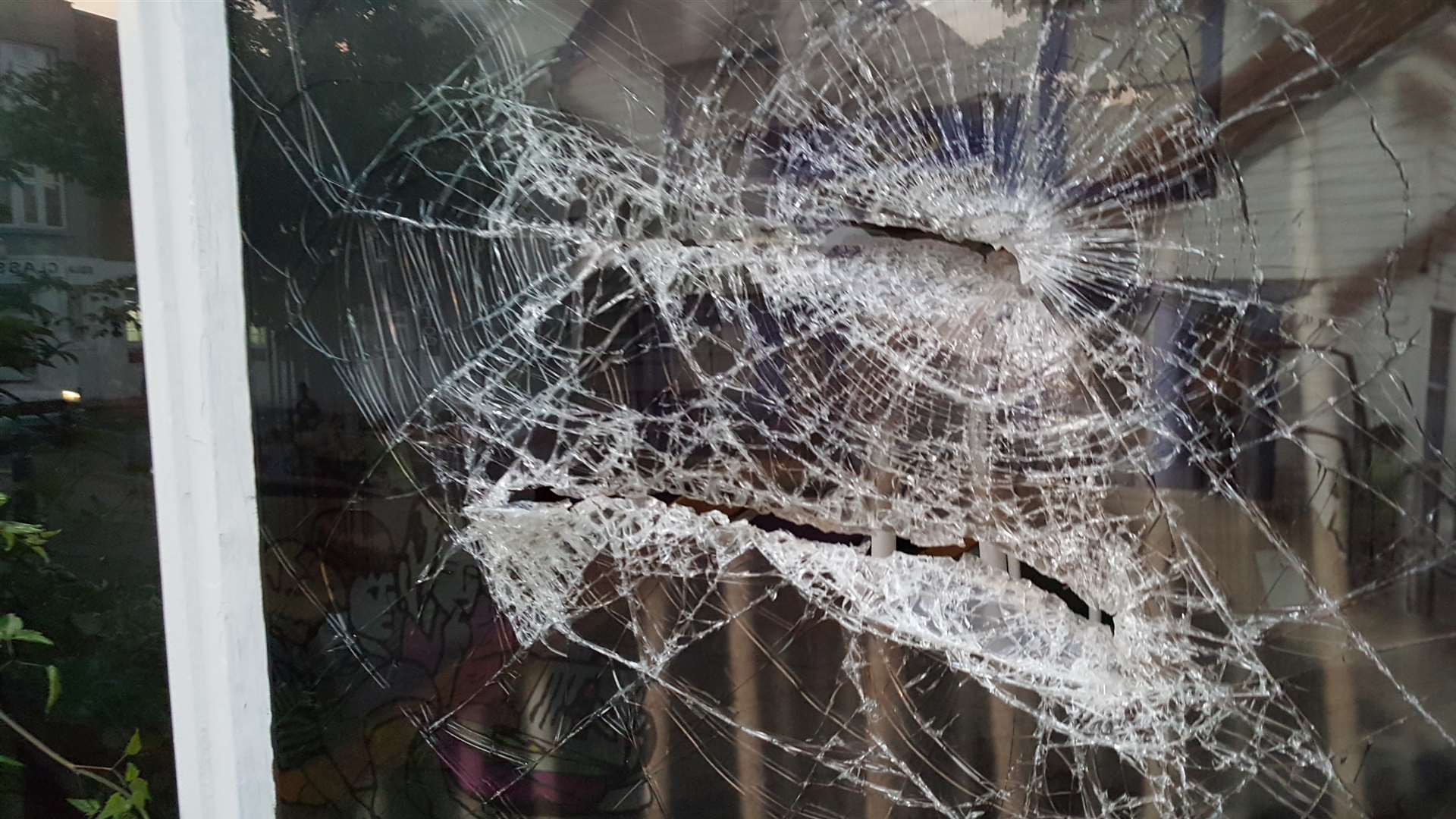 A window at the town's library was smashed.