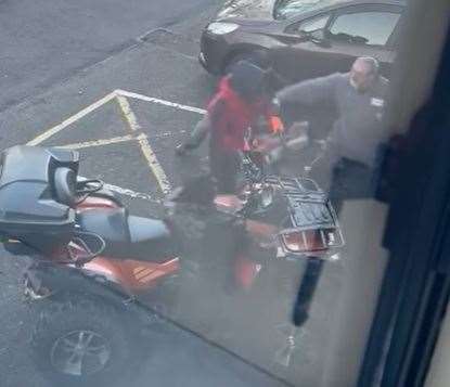 The owner confronts a chainsaw-wielding thug trying to steal his quad bike in broad daylight from outside a Sittingbourne factory