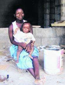 Mother and child in Ghanaian fishing village
