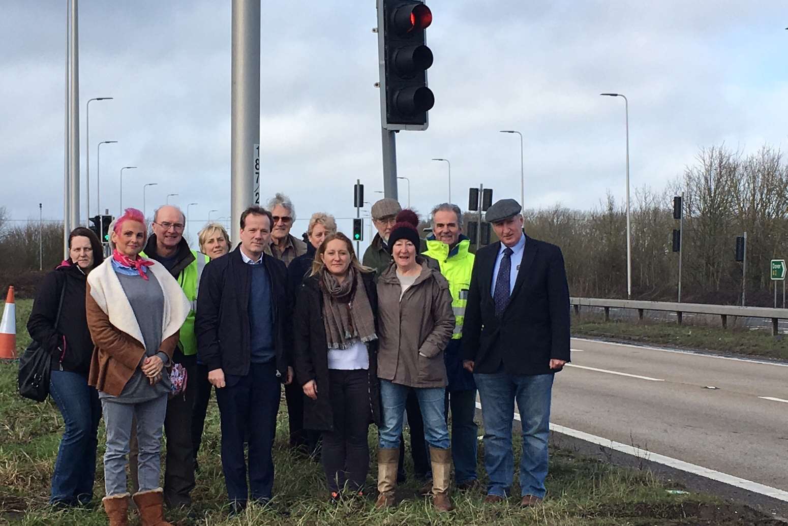 Dover MP Charlie Elphicke with residents at the lights at the Lydden Hill junction by the A2. Charlotte Byrom is pictured directly to his right