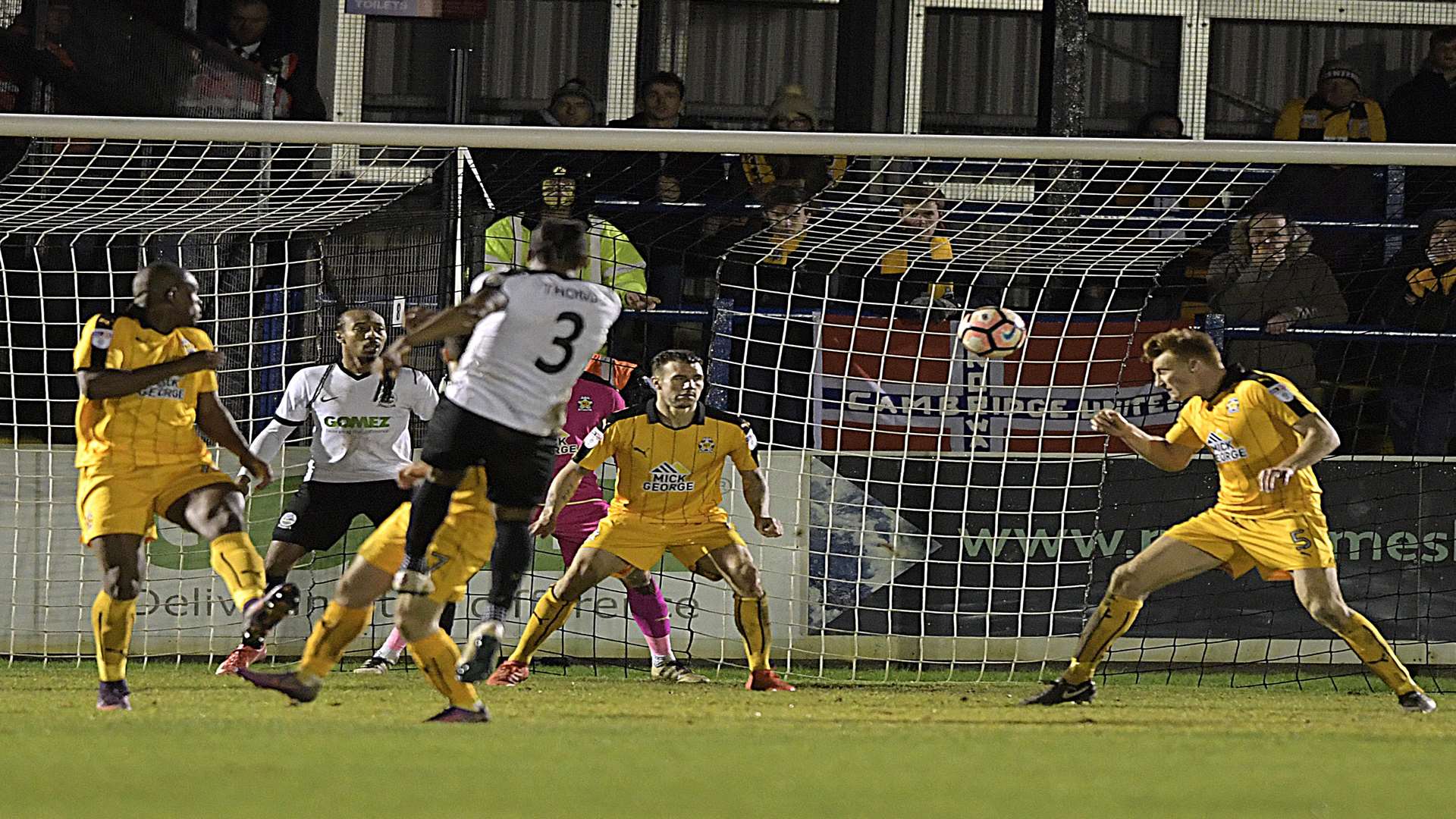 Dover's Aswad Thomas scores from the edge of the penalty area. Picture: Barry Goodwin