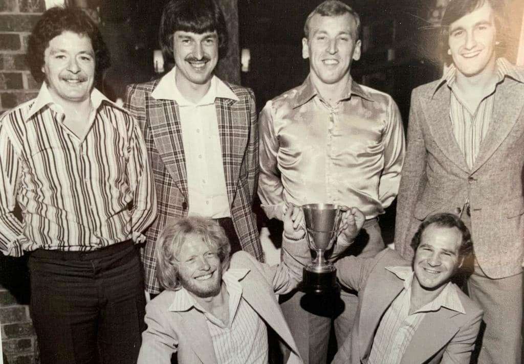 John Picot was part of the 1979/80 Kent League title-winning side. Pictured bottom right holding the trophy. Photo credit: Louise Picot