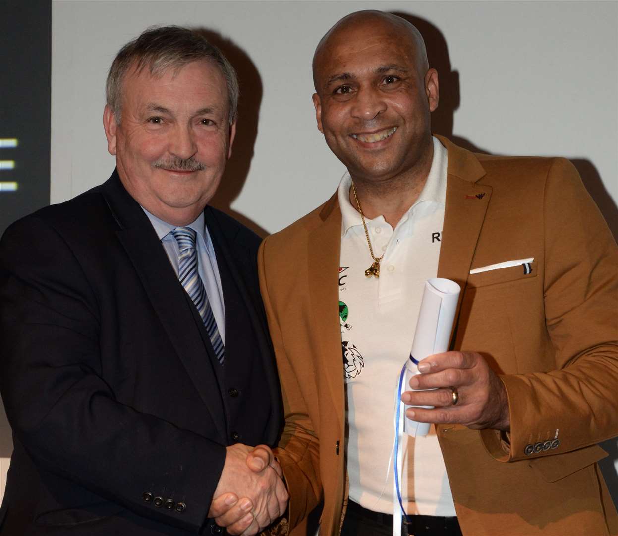 Cllr Alan Jarrett inducts Ian John-Lewis into the Hall of Fame. Picture: Chris Davey