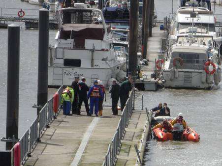 Rescue crews at Rochester Pier after a body was found in the River Medway