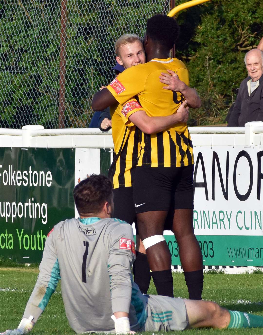 Paxman and team-mate David Smith celebrate one of their goals during the win. Picture: Randolph File