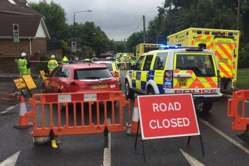 Emergency services at the scene of the crash in Robin Hood Lane, Chatham. Picture: @Garethcook7