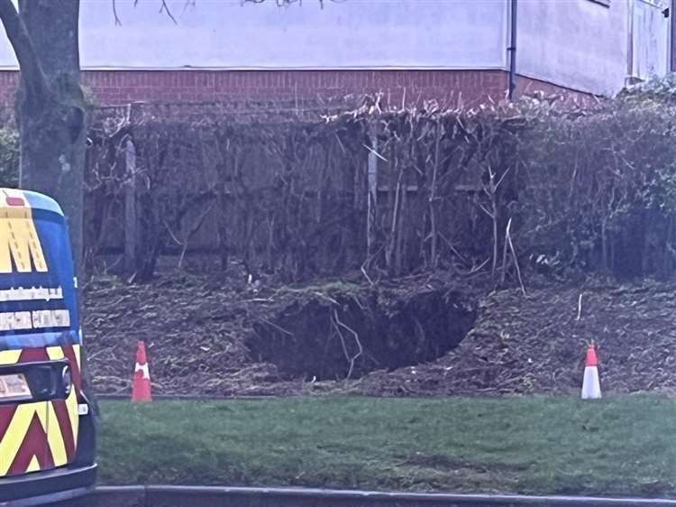 The hole as seen in New House Lane, Gravesend on Friday (February 9). Picture: Paul Watts
