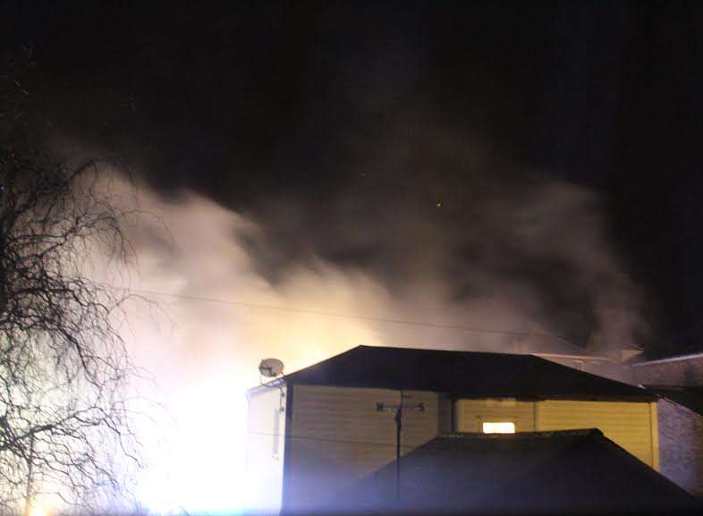 At the height of the blaze, smoke could be seen pouring from the building. Picture: Edward Lucas
