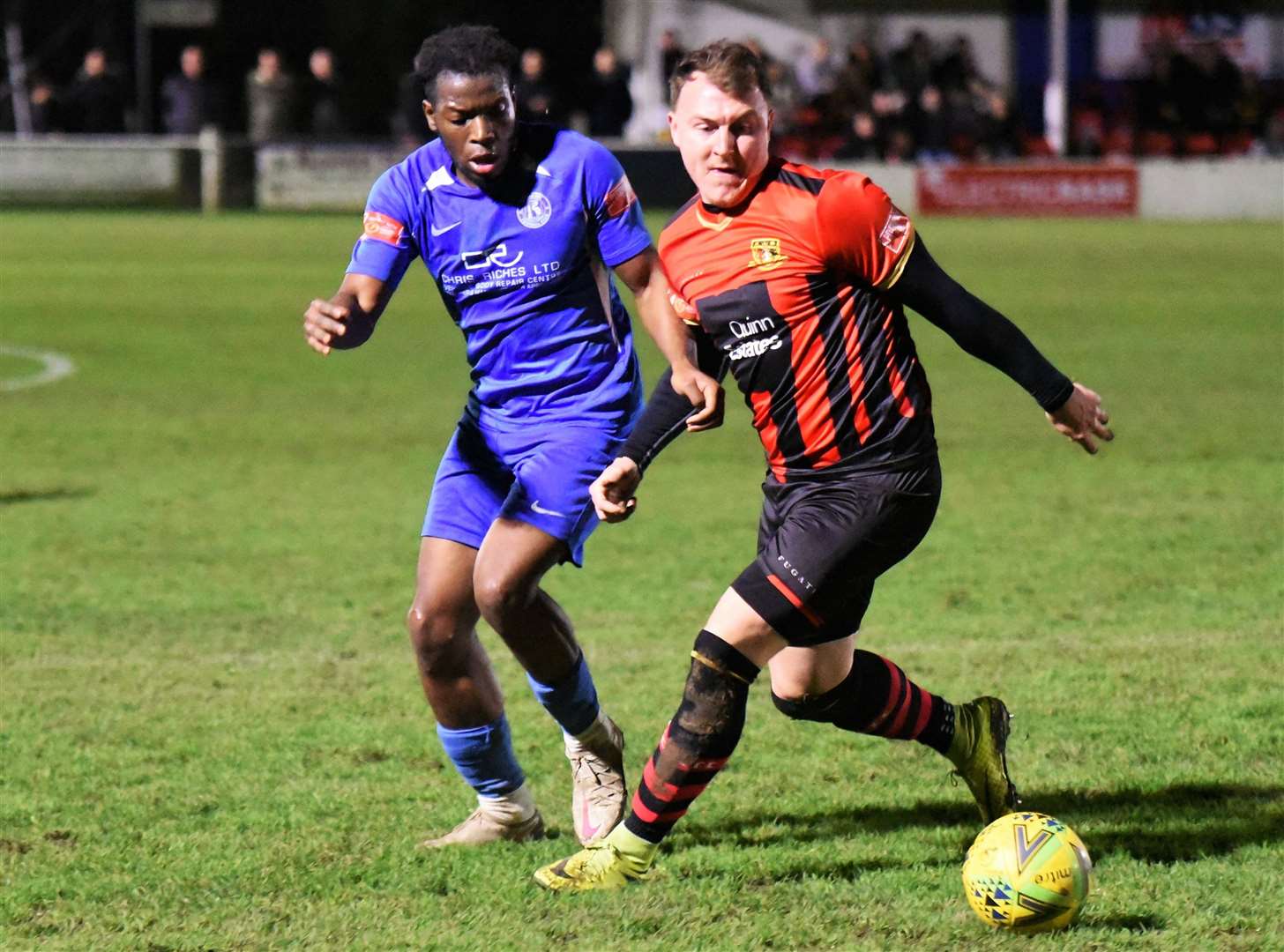Alex Flisher is closed down by Herne Bay's Bode Anidugbe during the 1-1 league draw between the sides. Picture: Ken Medwyn