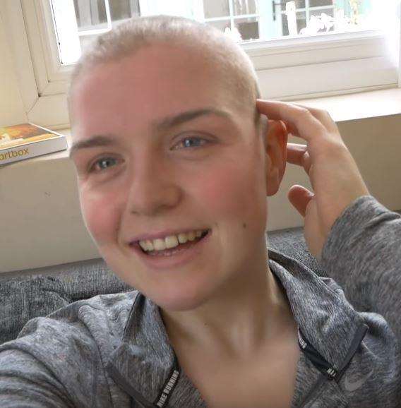 Emily Hayward puts on a brave smile after her headshave (2825892)