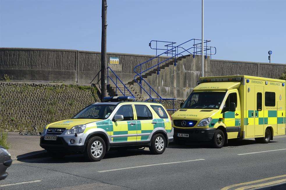 Ambulance vehicles at the sea wall off Marine Parade, Sheerness