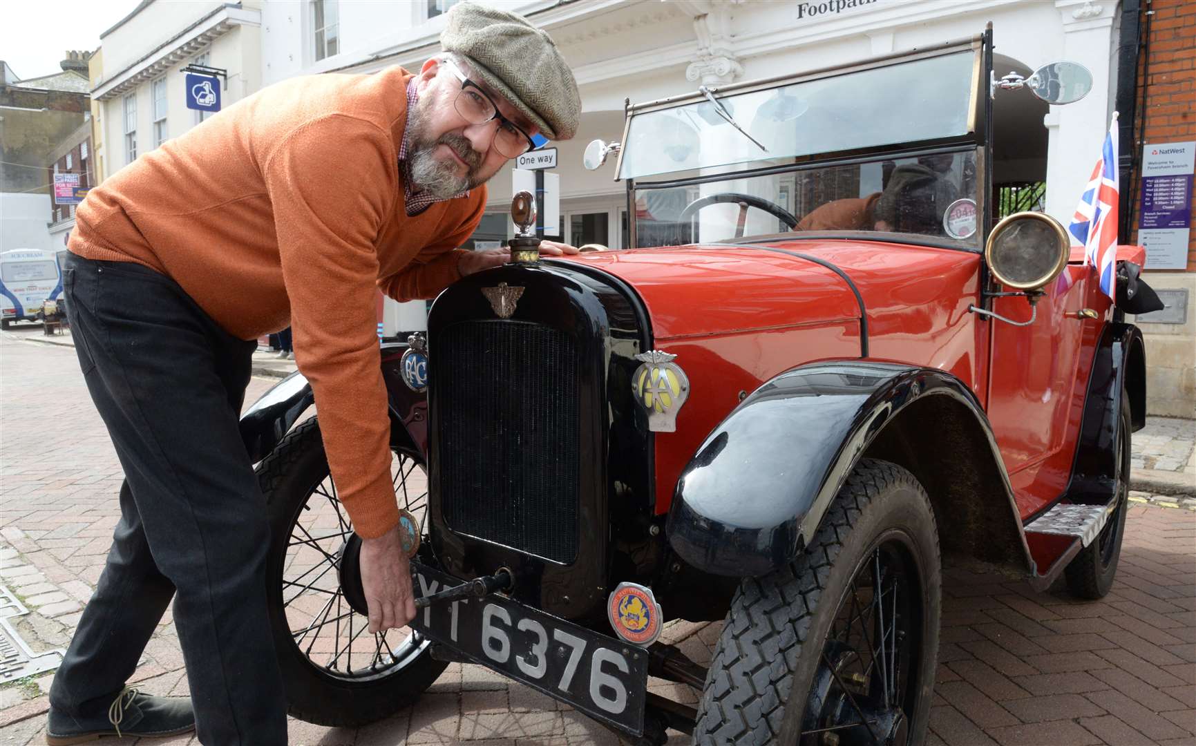 Tony Roberts starts his 1926 Austin 7 Chummy at last year's Faversham Transport Weekend Picture: Chris Davey
