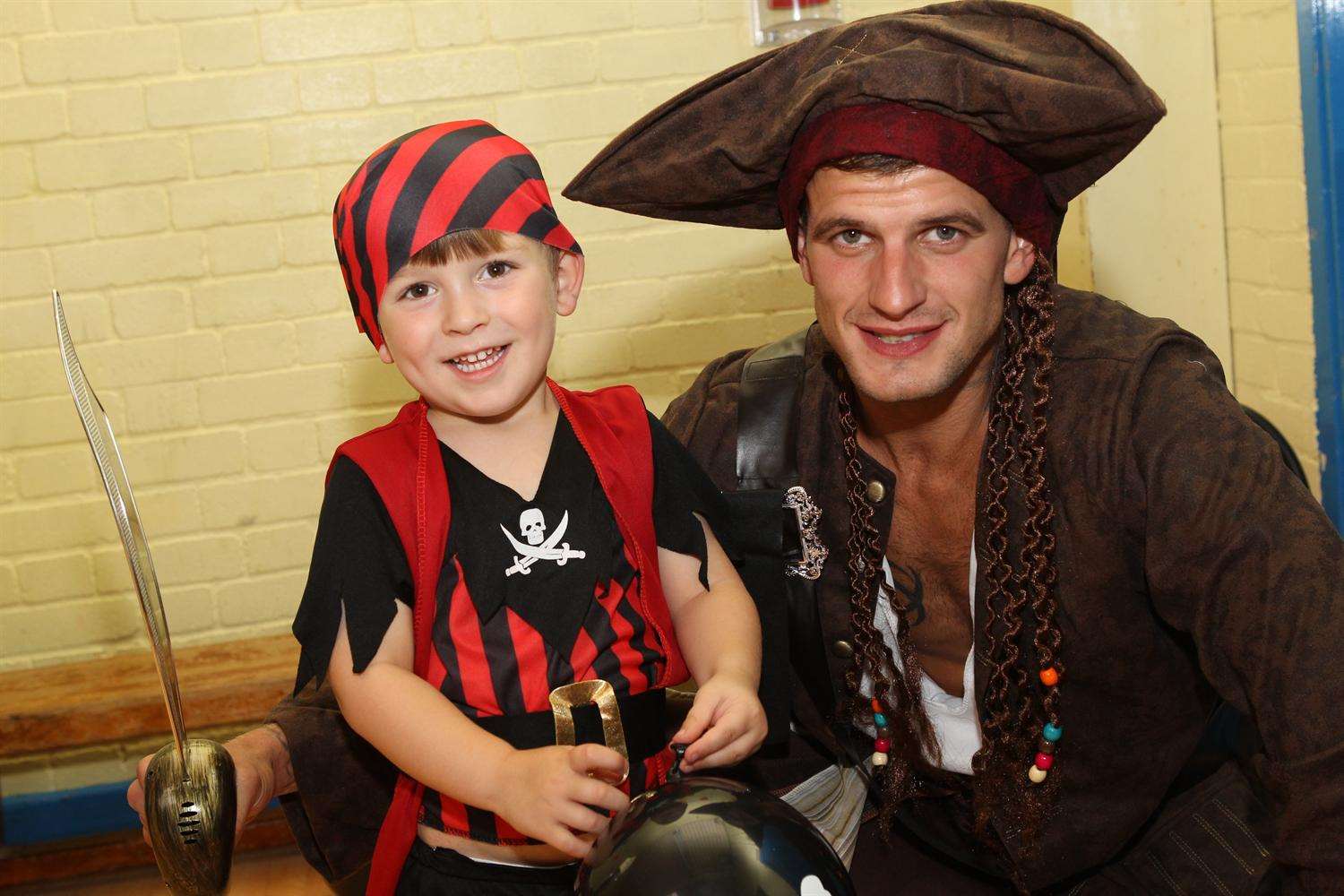 Three-year-old Oakley Creed with pirate, Lee Church.