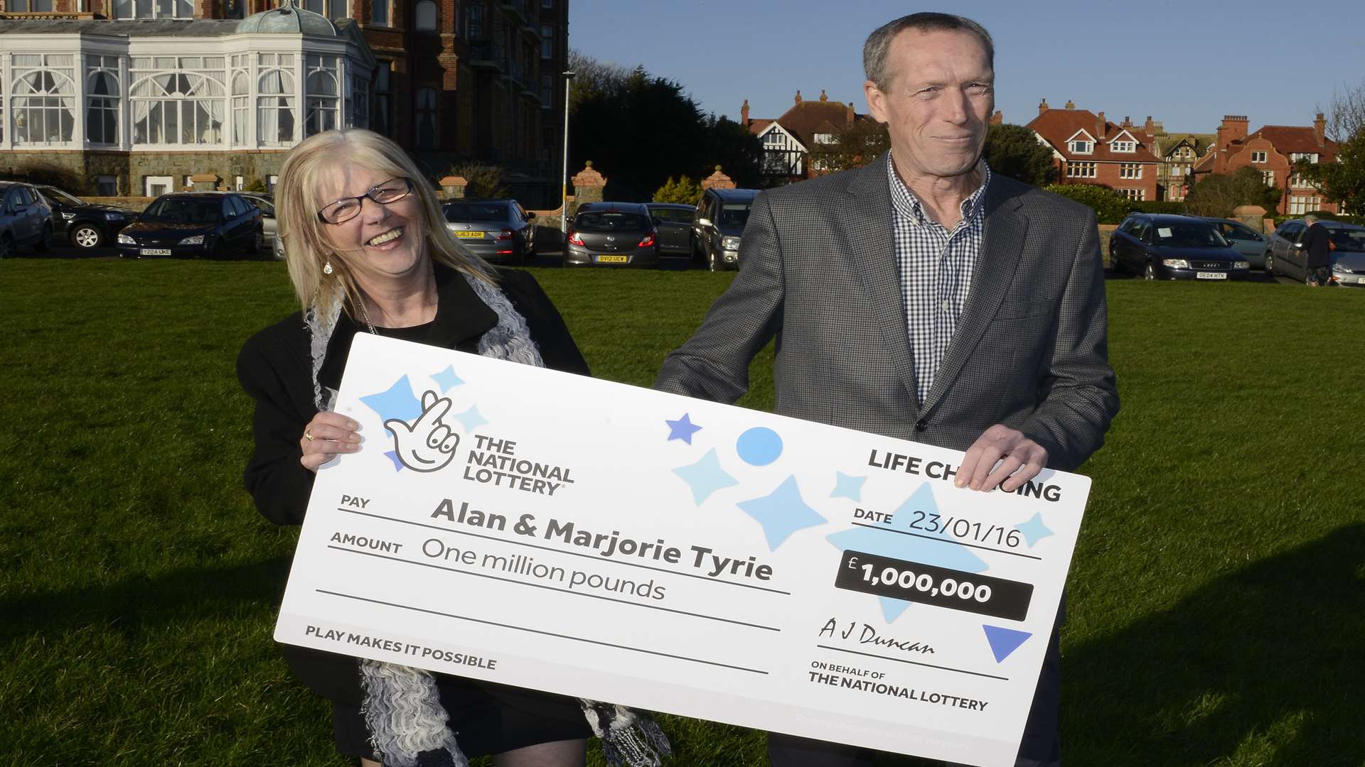 Marjorie and Alan Tyrie with their cheque