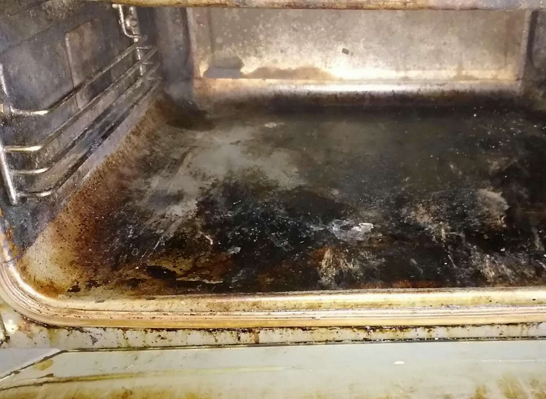 The oven is black with grime. Picture: SWNS