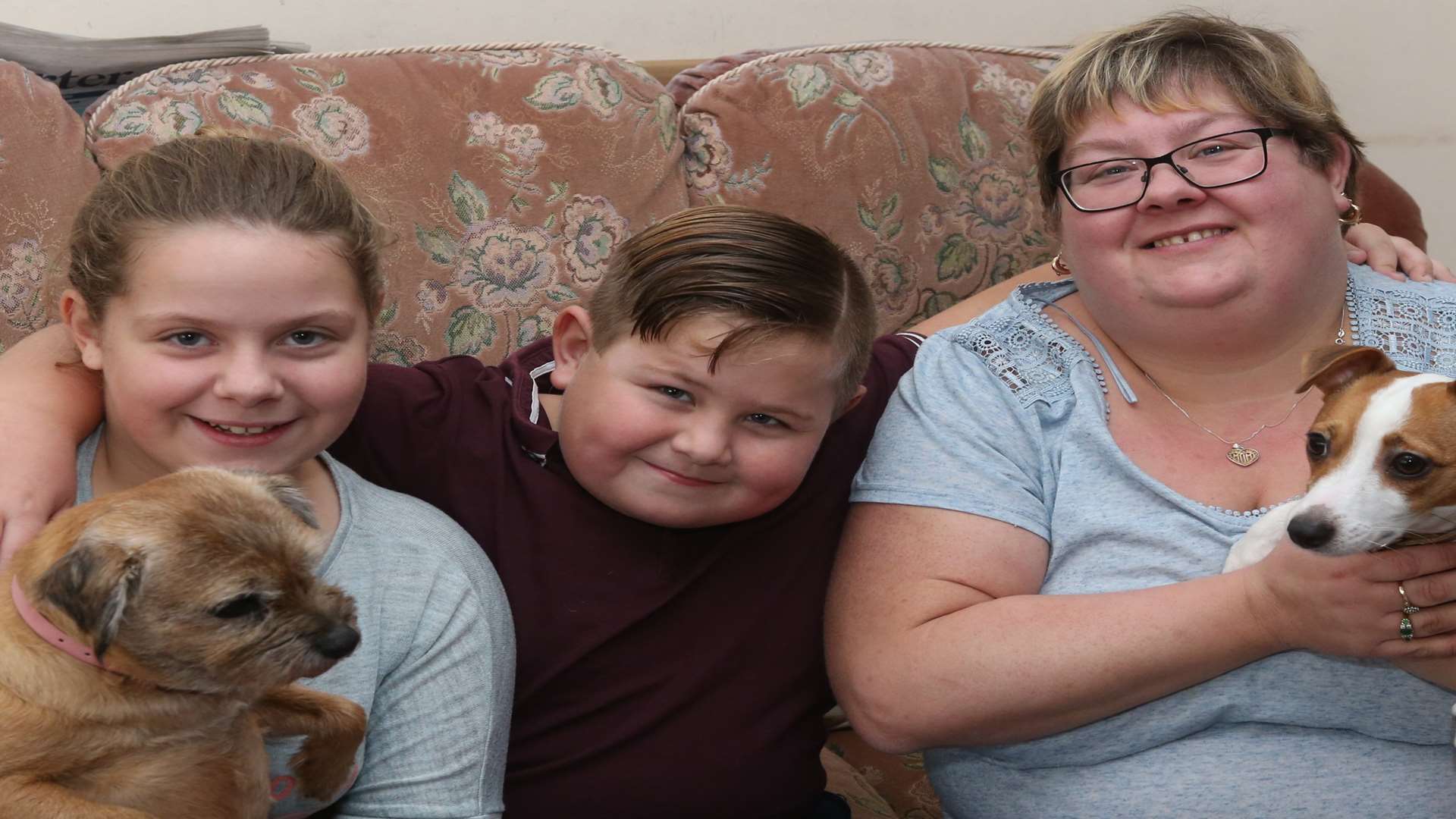 Emily Lindridge, 13 with her brother, Aaron, eight, and mother, Tracy