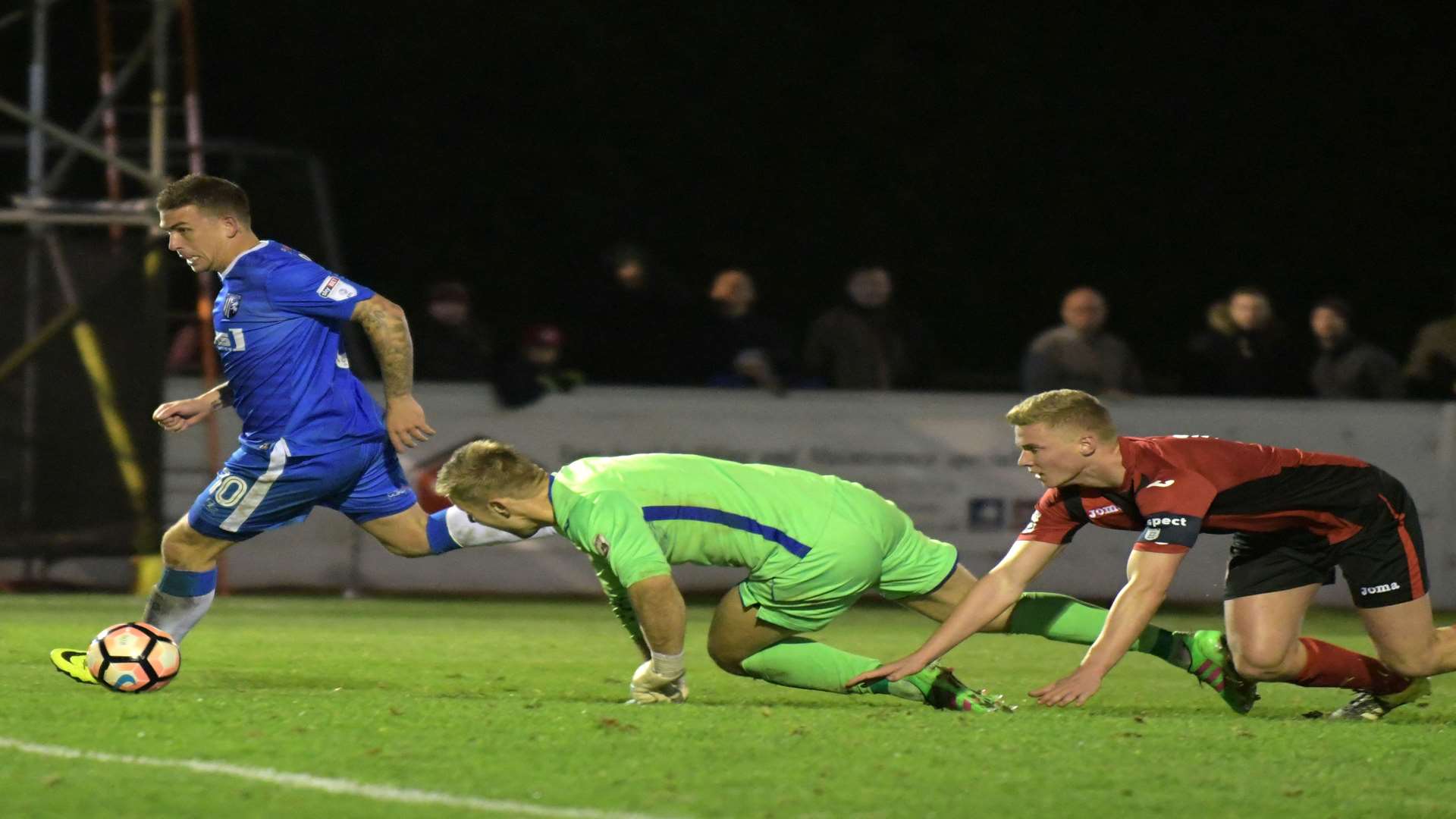 Cody McDonald scores Gillingham's third goal against Brackley in the FA Cup replay Picture: Barry Goodwin