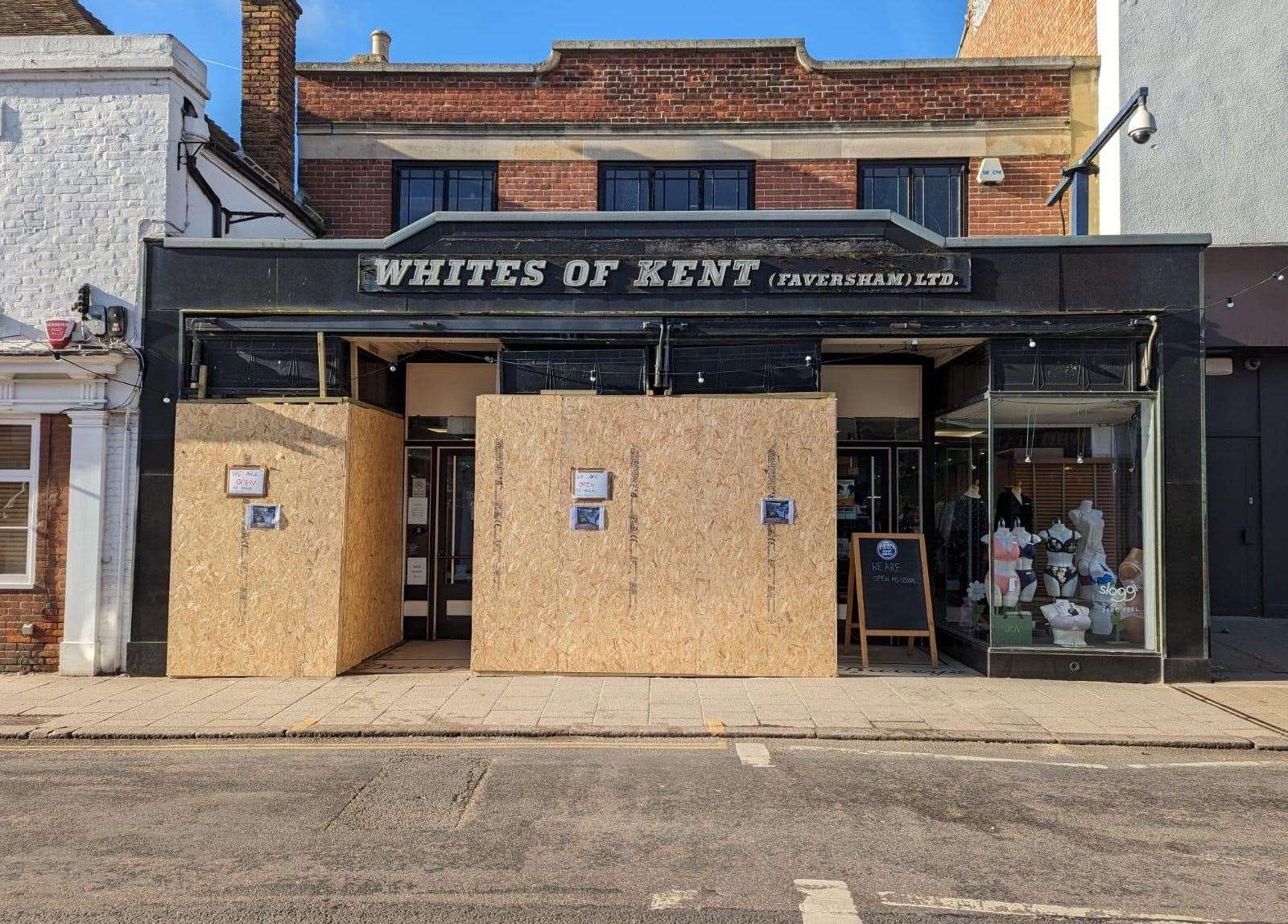 The windows have been boarded up at Whites of Kent in Whitstable High Street. Picture: Nigel White