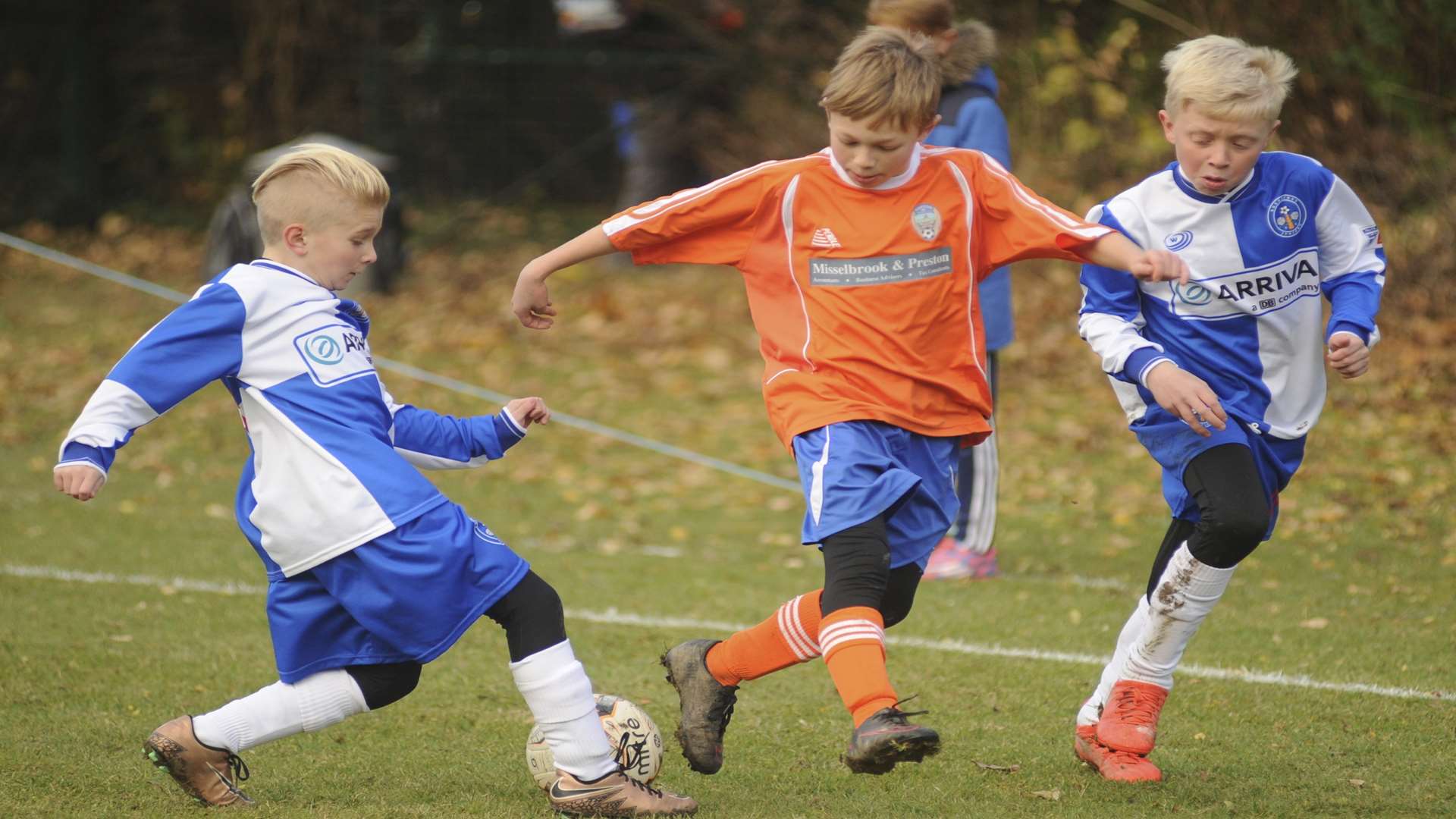 Bredhurst Juniors team up to win back possession from Cuxton 91 Picture: Steve Crispe