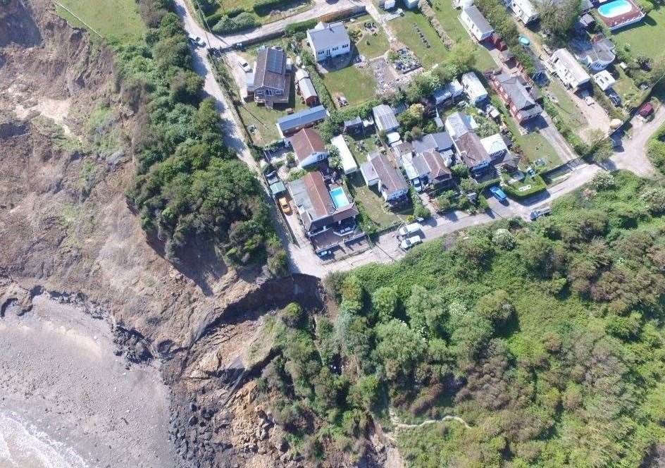 Drone footage shows how close the nearest home is to the cliff collapse Credit: RLH Media