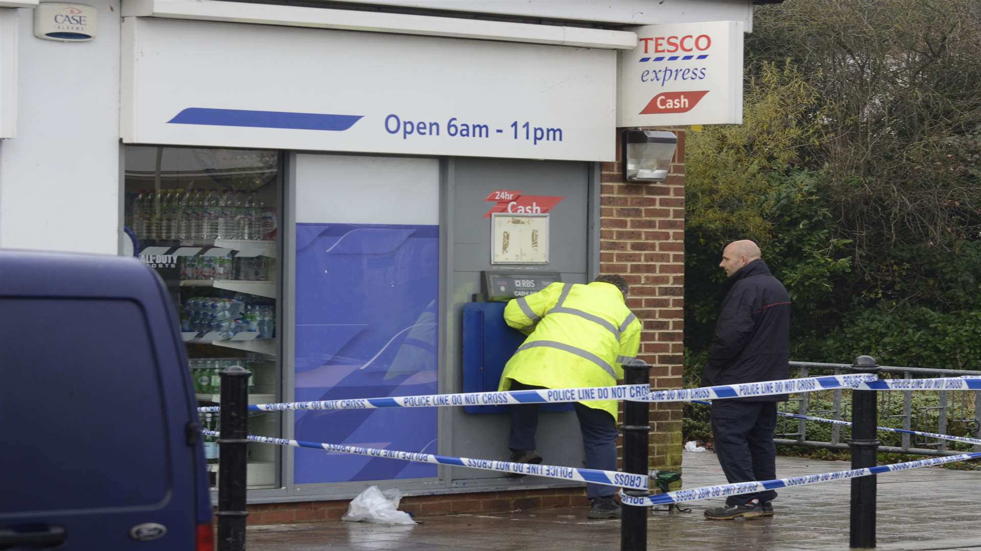 Police at the scene of the ram-raid at the Tesco Express in Hythe Road