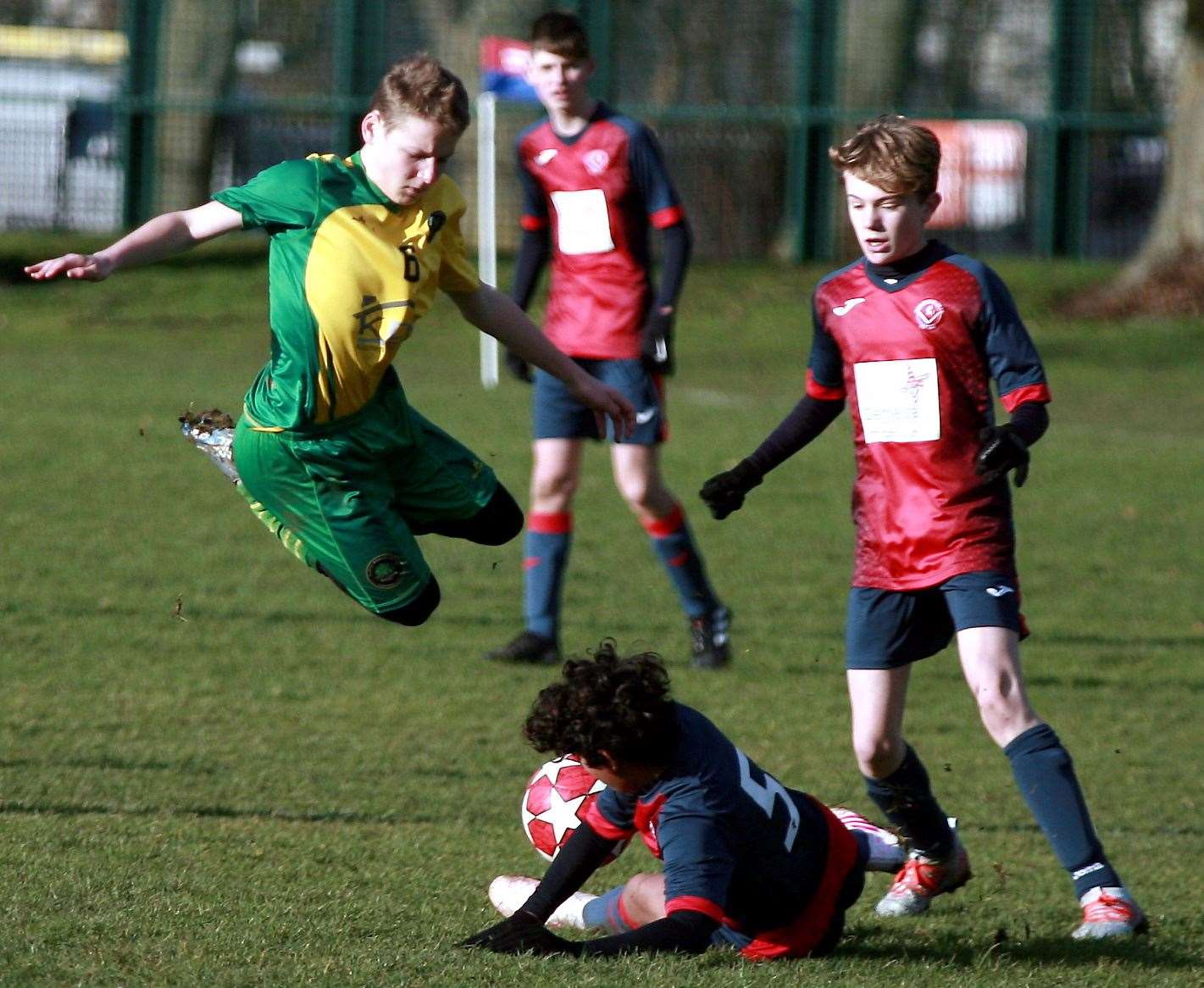 Cliffe Woods Colts under-15s (green) take evasive action against Hempstead Valley under-15s. Picture: Phil Lee FM26563336