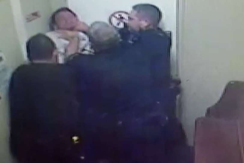 The officers are seen restraining Jack Harbour in the leaked CCTV footage