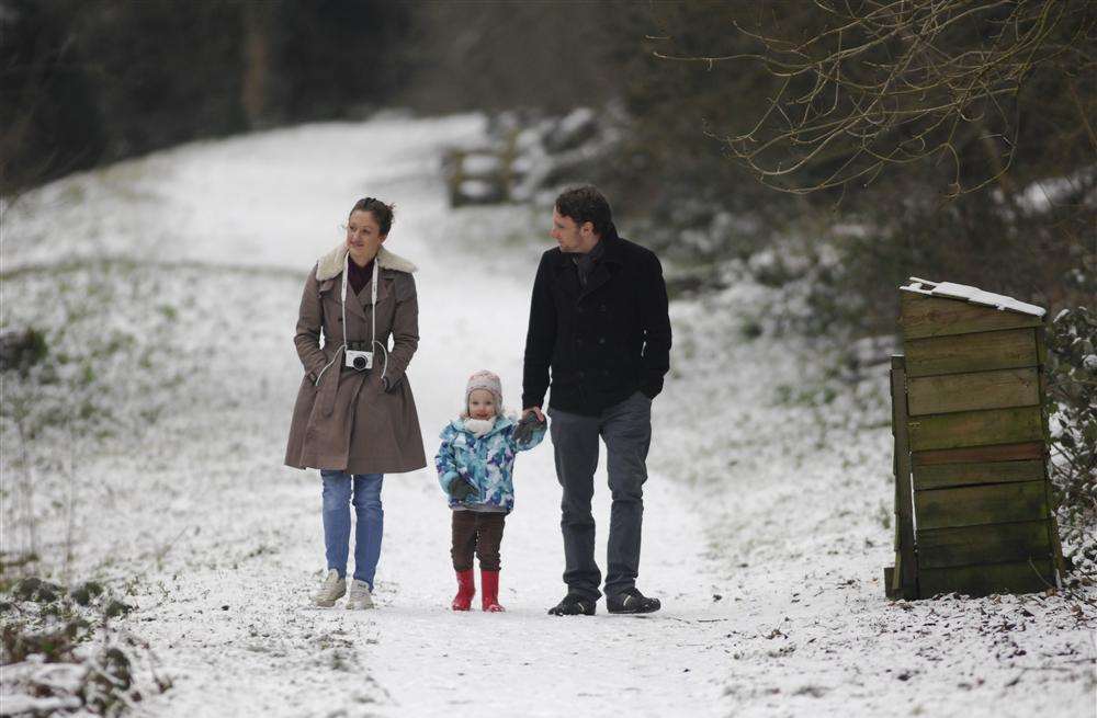 A family walk through Manor Park Country Park, West Malling, during last year's snow