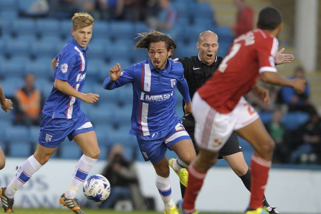 Bradley Dack tries to get Gills moving against Swindon Picture: Barry Goodwin