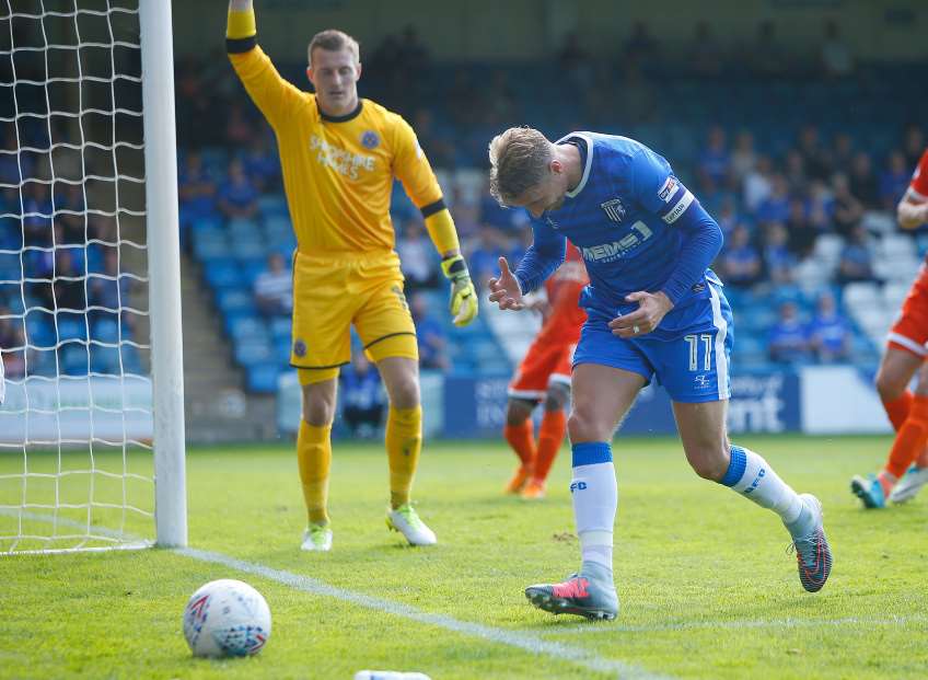Lee Martin puts a chance wide for Gills Picture: Andy Jones