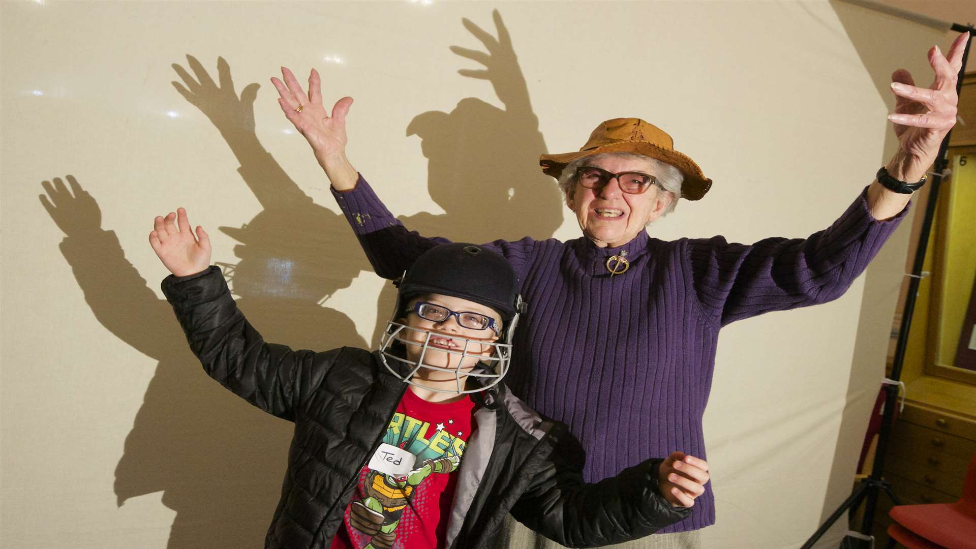 Ted, 7, with Barbara, 91, making shadow shapes.