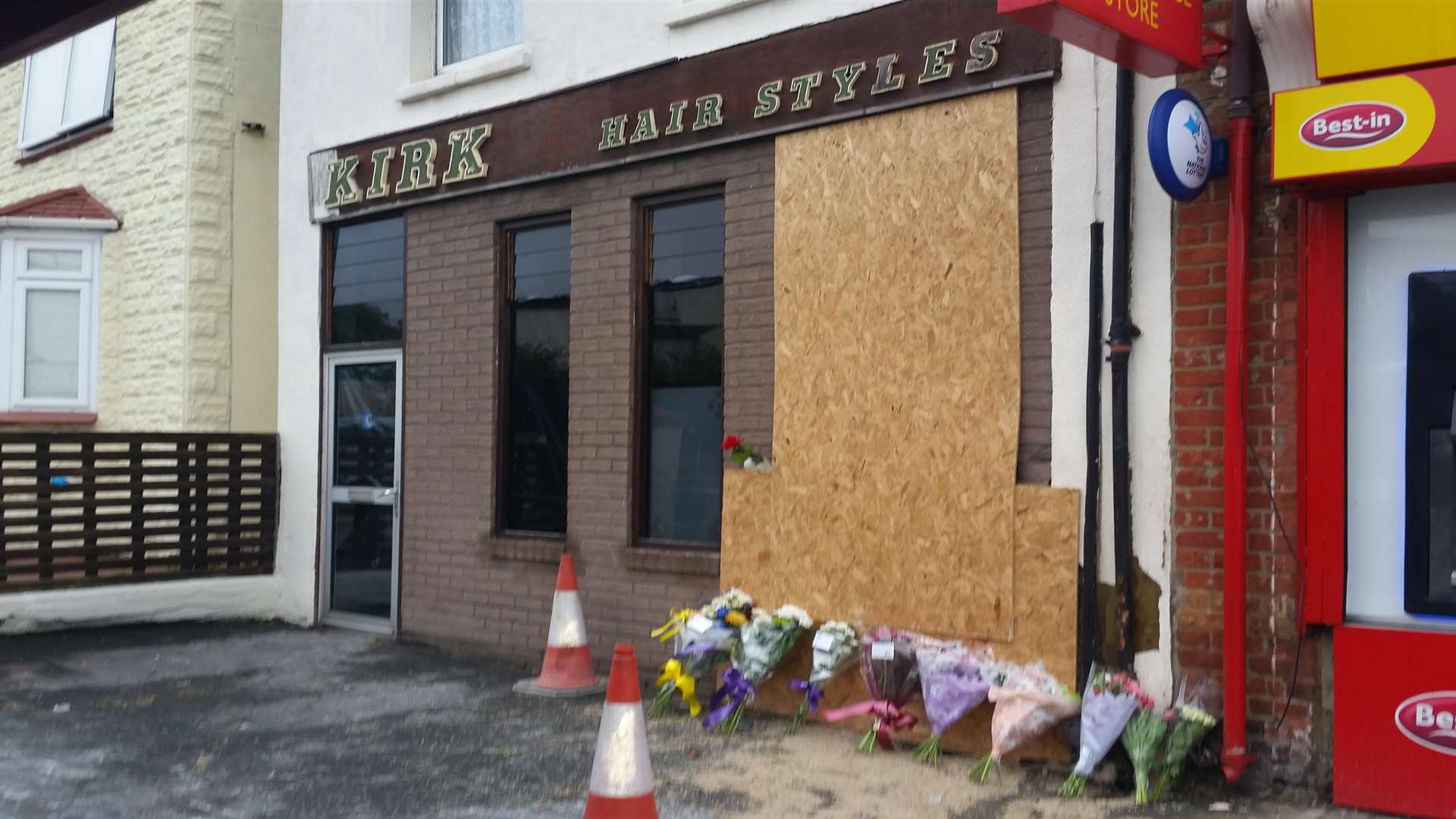 Flowers left at Kirk Hairstyles, Gillingham Road, Gillingham, after Mr Iandolo died