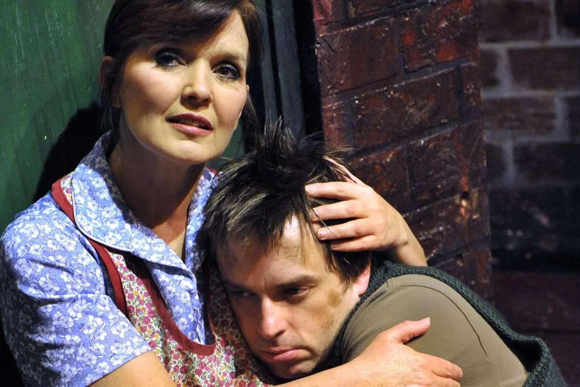 Maureen Nolan as Mrs Johnstone and Sean Jones as Mickey in Blood Brothers in a previous production