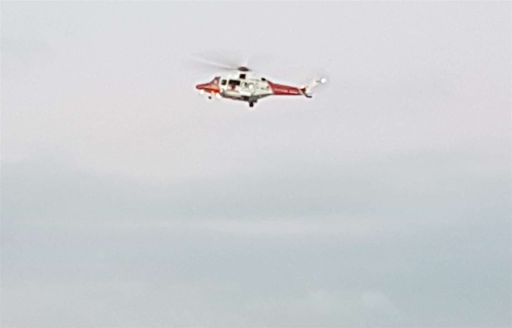 The Coastgaurd helicopter in operation during the seach (6441559)