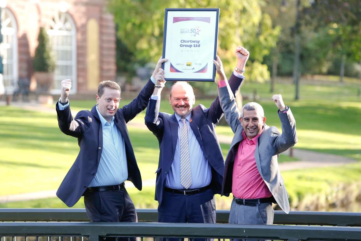 Chartway Group directors Stuart Mitchell, left, Philip Cunningham, centre, and Paul Safa celebrate being named MegaGrowth 50 winners for 2014