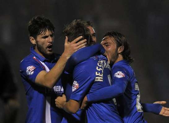 Bradley Dack joins the celebrations as Gills open the scoring Picture: Barry Goodwin