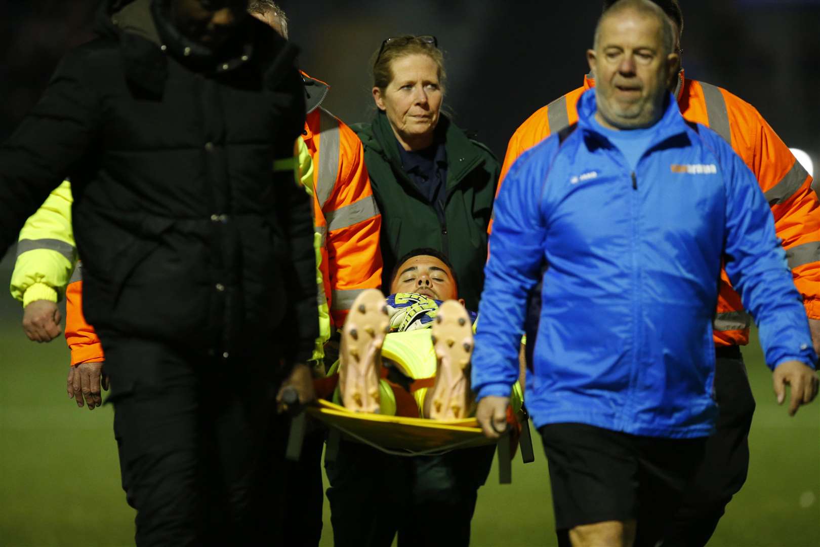 Dion-Curtis Henry is stretchered off with a foot injury Picture: Andy Jones