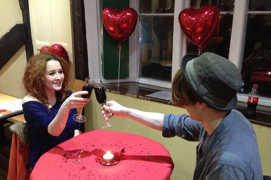 Laura and Corin toast their relationship