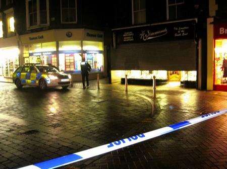 Police at the scene after the smash and grab raid in Deal High Street