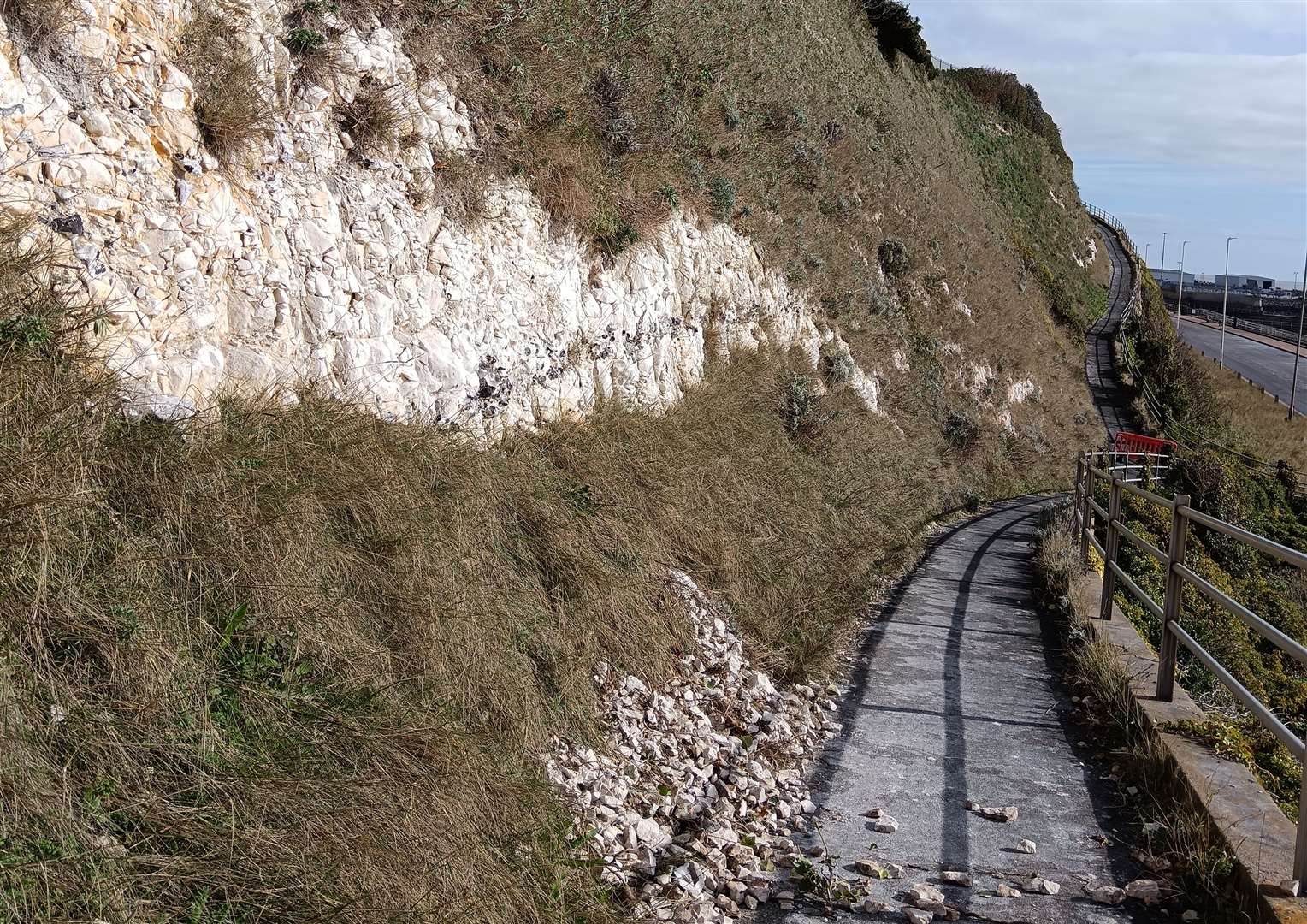 Chunks of chalk have fallen down onto the footpath along West Cliff Promenade. Picture: Nik Mitchell