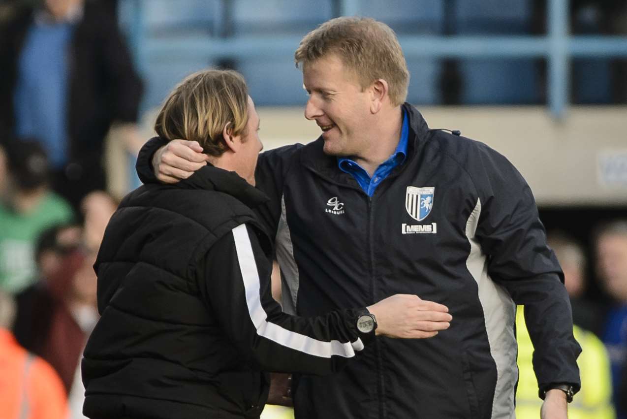 Boss Ady Pennock and first-team coach Jamie Day celebrate victory at full-time Picture: Andy Payton
