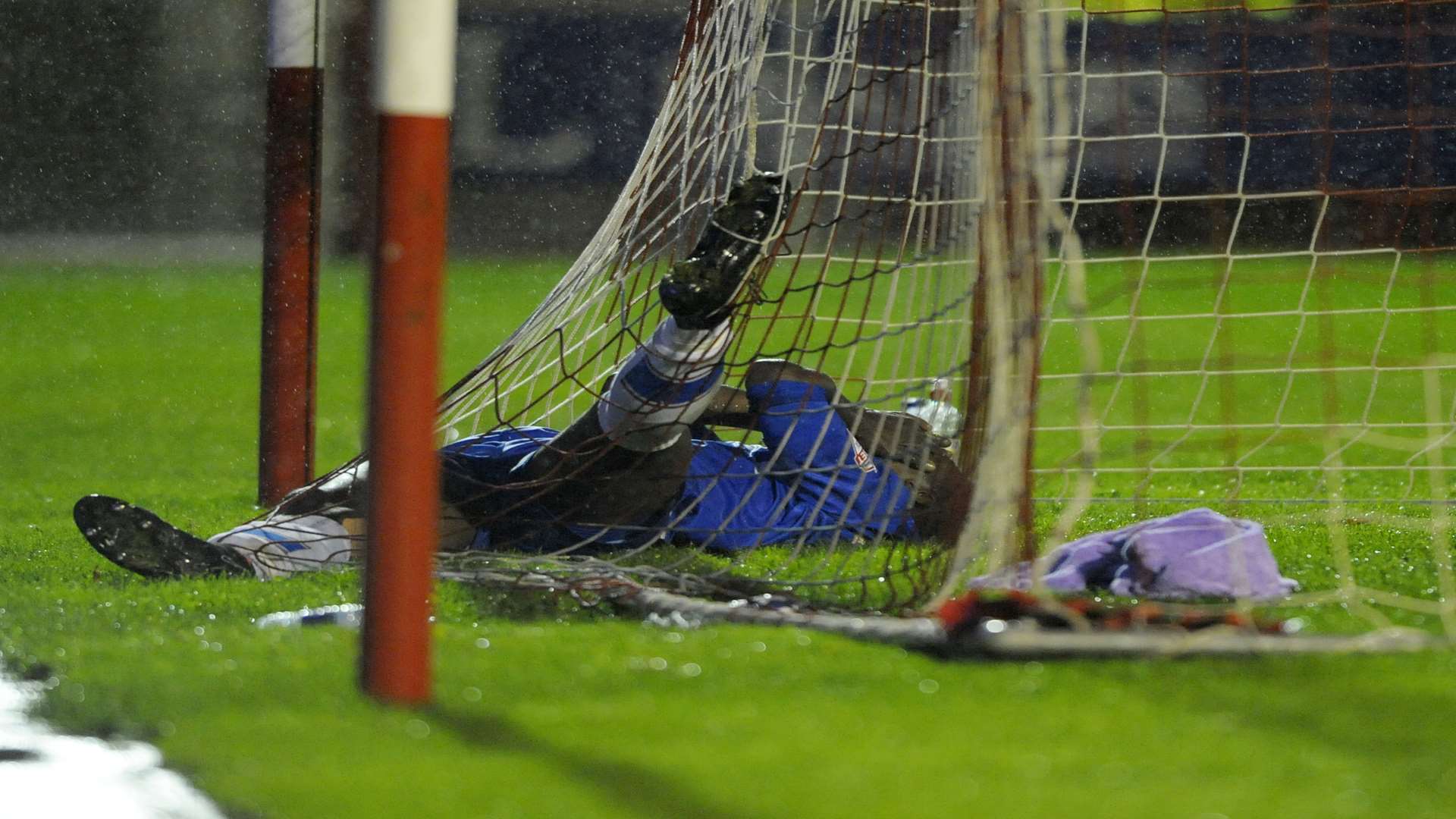 Jermaine McGlashan ends up in the net after his miss of the season Picture: Barry Goodwin